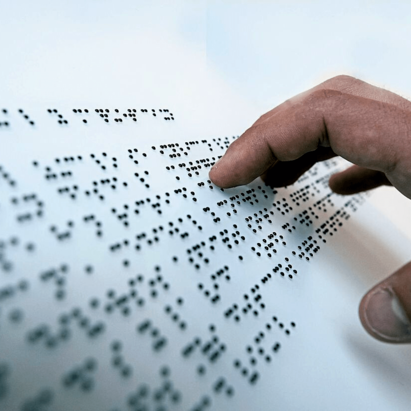 A blind person using brail