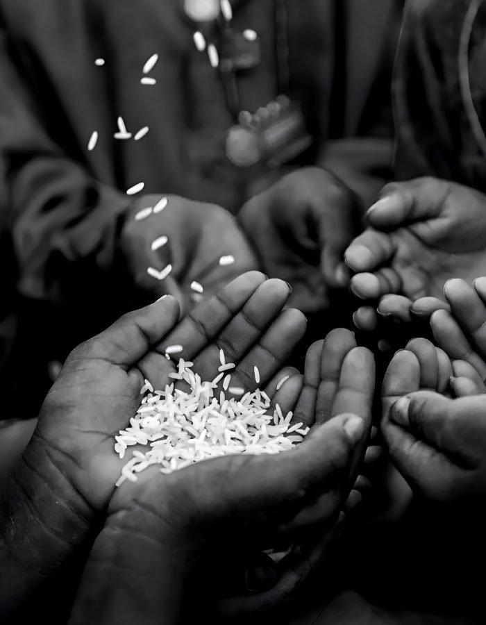   The gift of sharing by hope in every grain. - Mantu Khot -  Global Ability Photography Challenge 