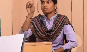 WEDO: Women Entrepreneurs with Disabilities - A girl sitting confidently in an office environment, representing empowerment and inclusivity in entrepreneurship for women with disabilities.